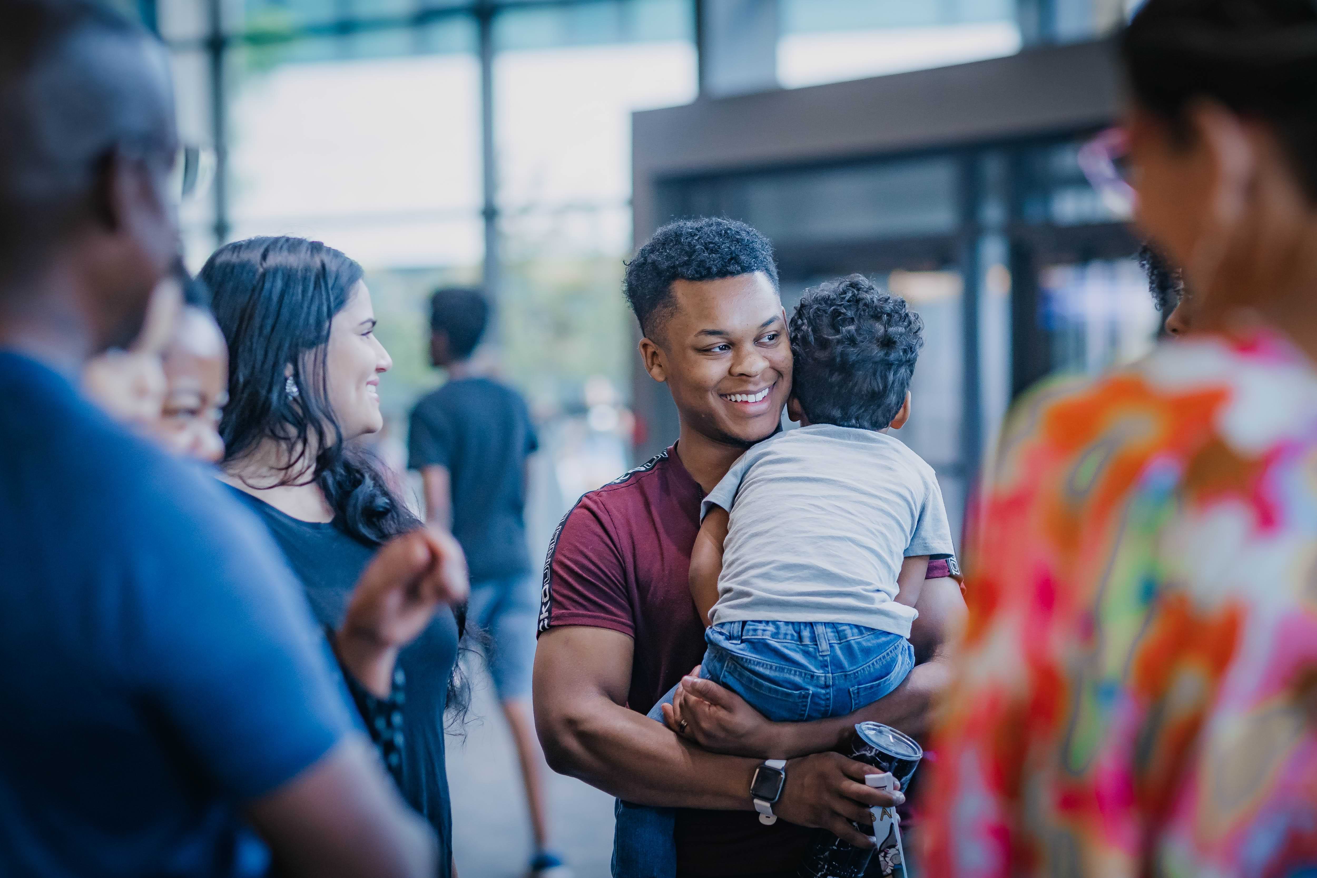 Man holding his son